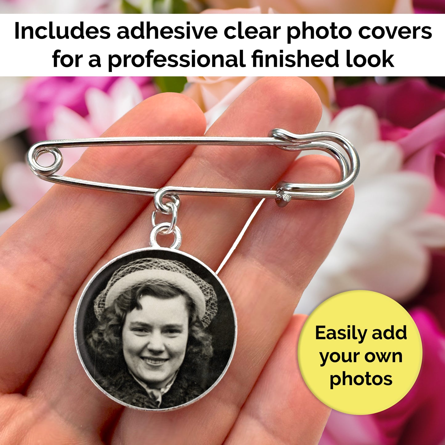 A memorial photo pin for a wedding that you can add your own photo to. It is shown in the palm of a hand with flowers in the background to demonstrate that it can be used on the bride's flowers or the groom's boutonniere.