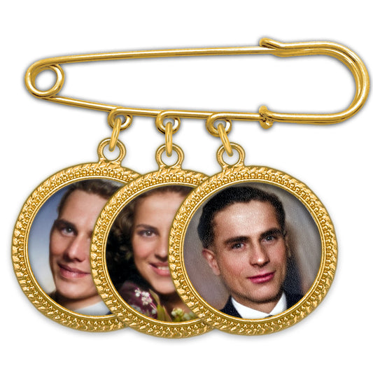 A wedding bouquet photo charm pin that holds 3 photos for remembering loved ones on your wedding day. It can also be used as a memorial boutonniere pin.