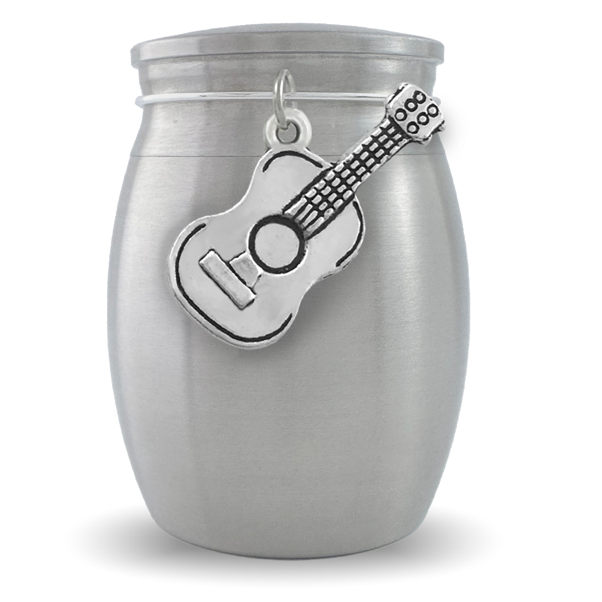 Mini guitar urn that holds a small amount of ashes shown on a plain background with guitar charm on the front. It holds a keepsake amount of ashes and is a way to distribute ashes among family members.