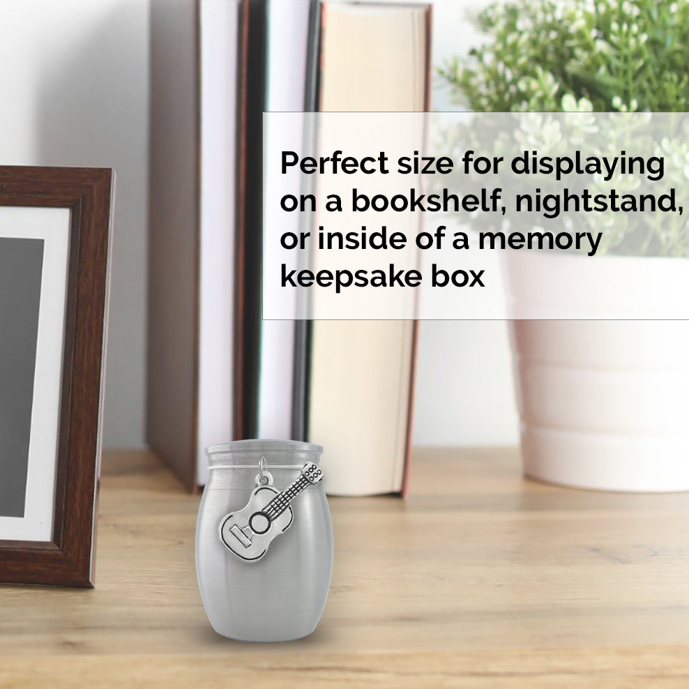 The small guitar urn is the perfect size for displaying on a bookshelf, nightstand, or inside of a memory keepsake box to keep a small amount of ashes.