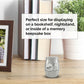 A small silver keepsake urn with a bird and 'Mom' engraving sits on a wooden bookshelf top in a styled home setting, with a text overlay explaining its use for bookshelves, nightstands, or memory keepsake boxes.