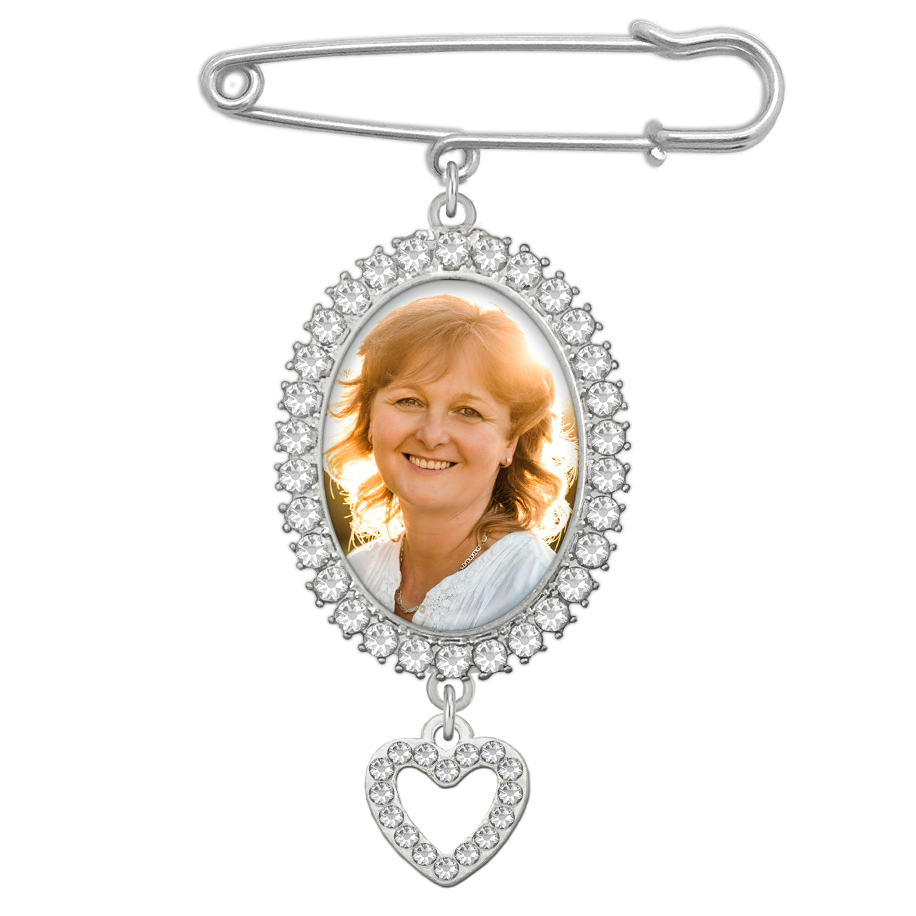 A silver wedding bouquet photo charm pin with an oval photo frame surrounded by clear rhinestones and a dangling heart-shaped rhinestone charm, shown on a plain white background.
