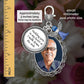 Silver memorial pendant charm with an oval photo frame holding a portrait of an older man, a round charm reading 'holding you in my heart as I walk down the aisle,' a small blue angel charm, shown with a ruler scale and text noting 40x30 millimeter oval photo size and approximately 3 inches long.